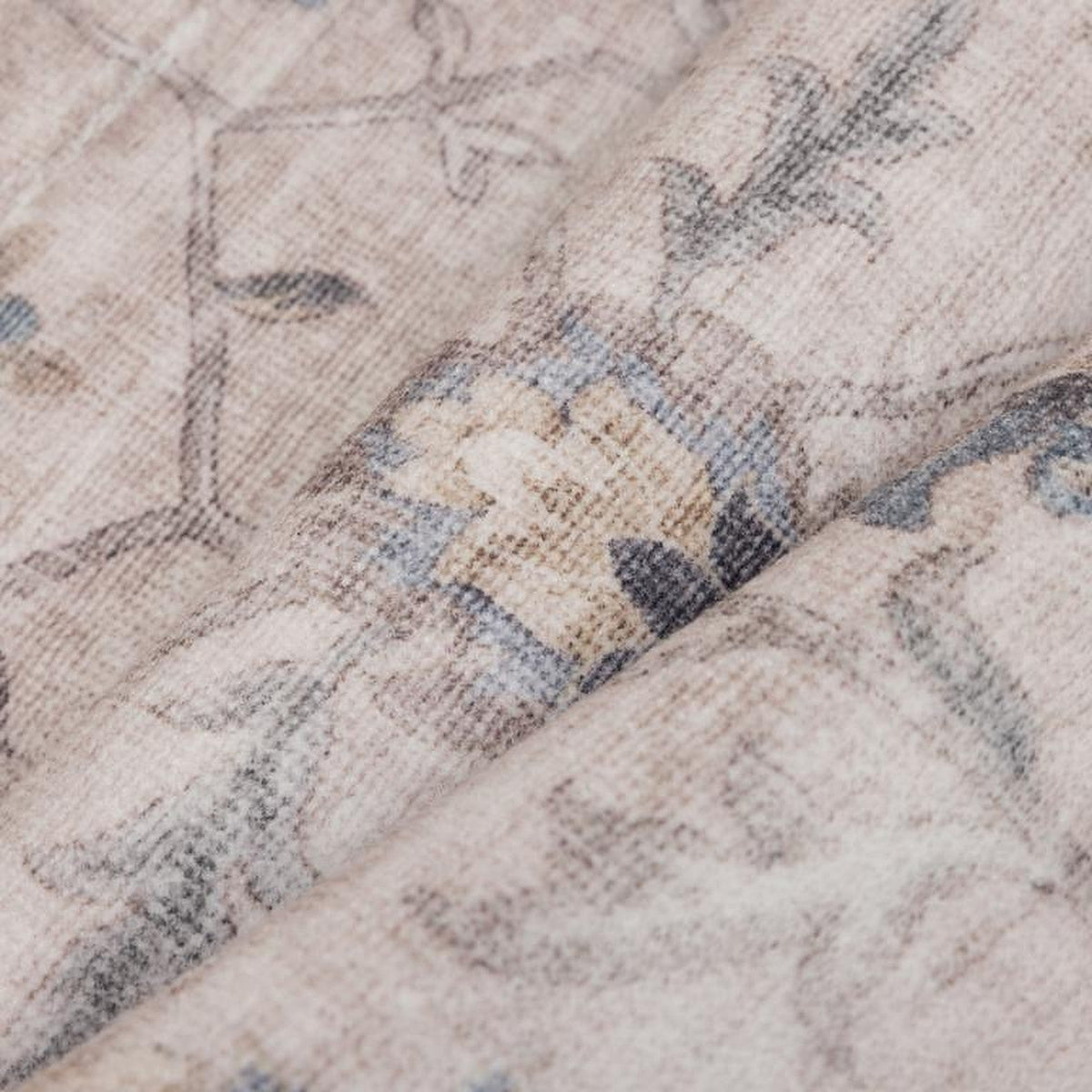 Tapis Albi, coloris beige et bleu, la matière de près
