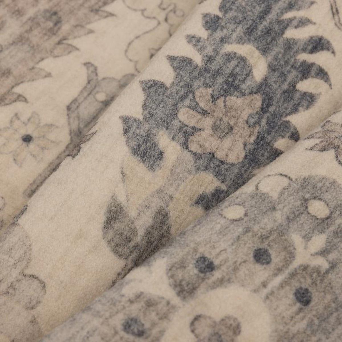 Tapis Moissac, coloris beige et bleu, la matière de près