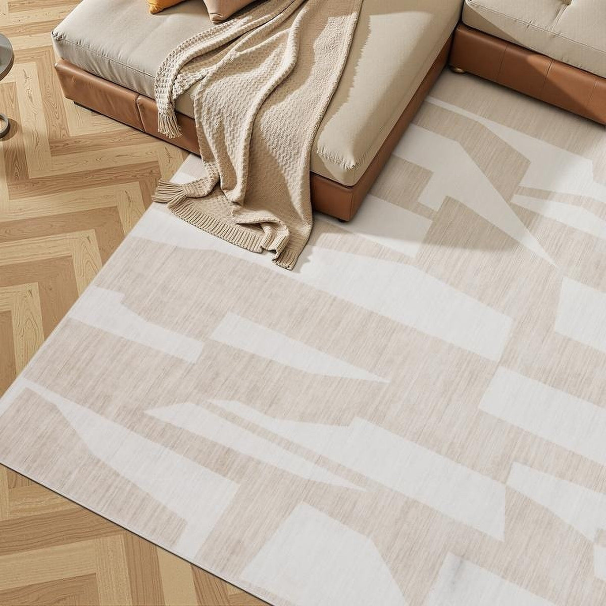 Tapis Millau, coloris ivoire et beige, devant le canapé
