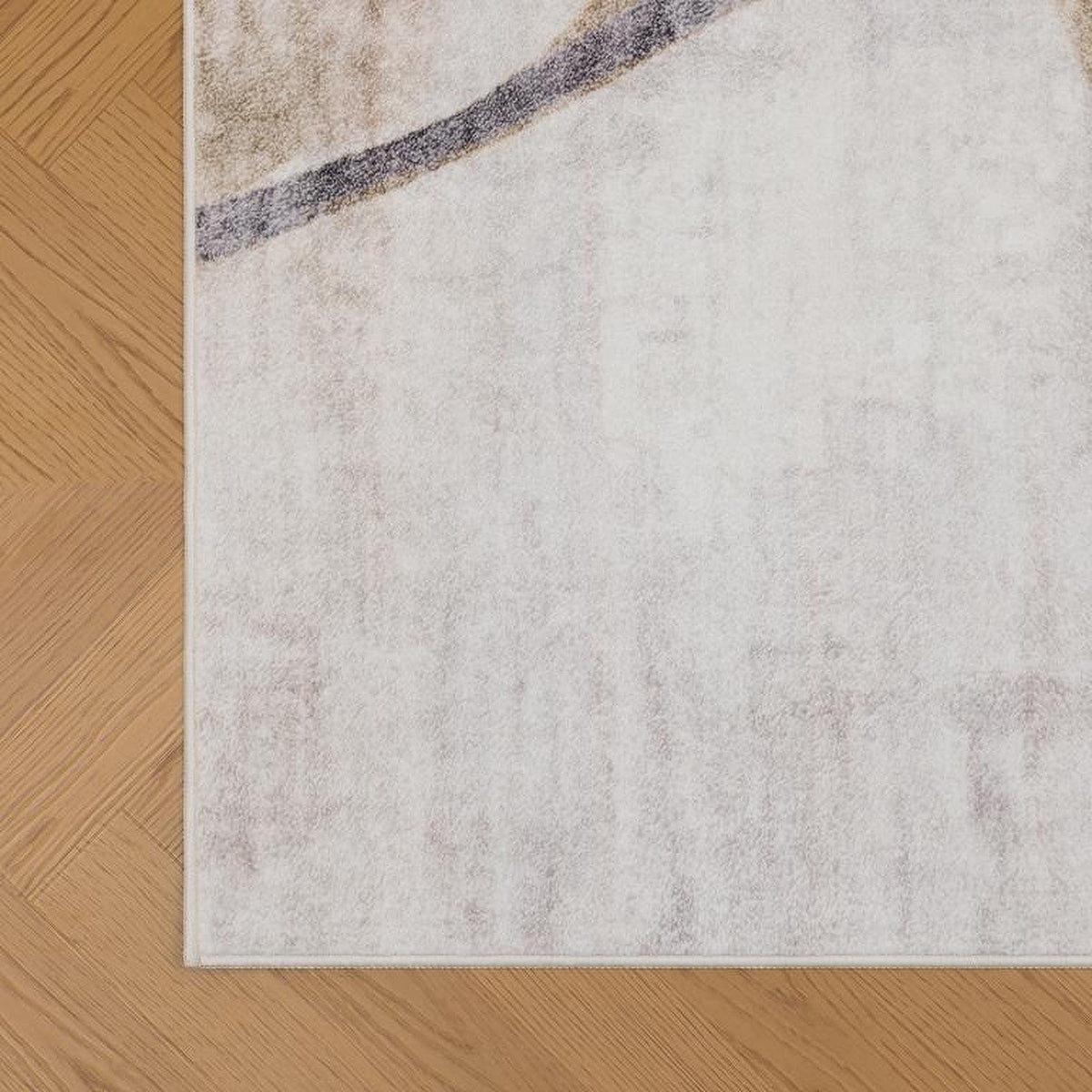 Tapis Millau, coloris ivoire et gris, le bord de près