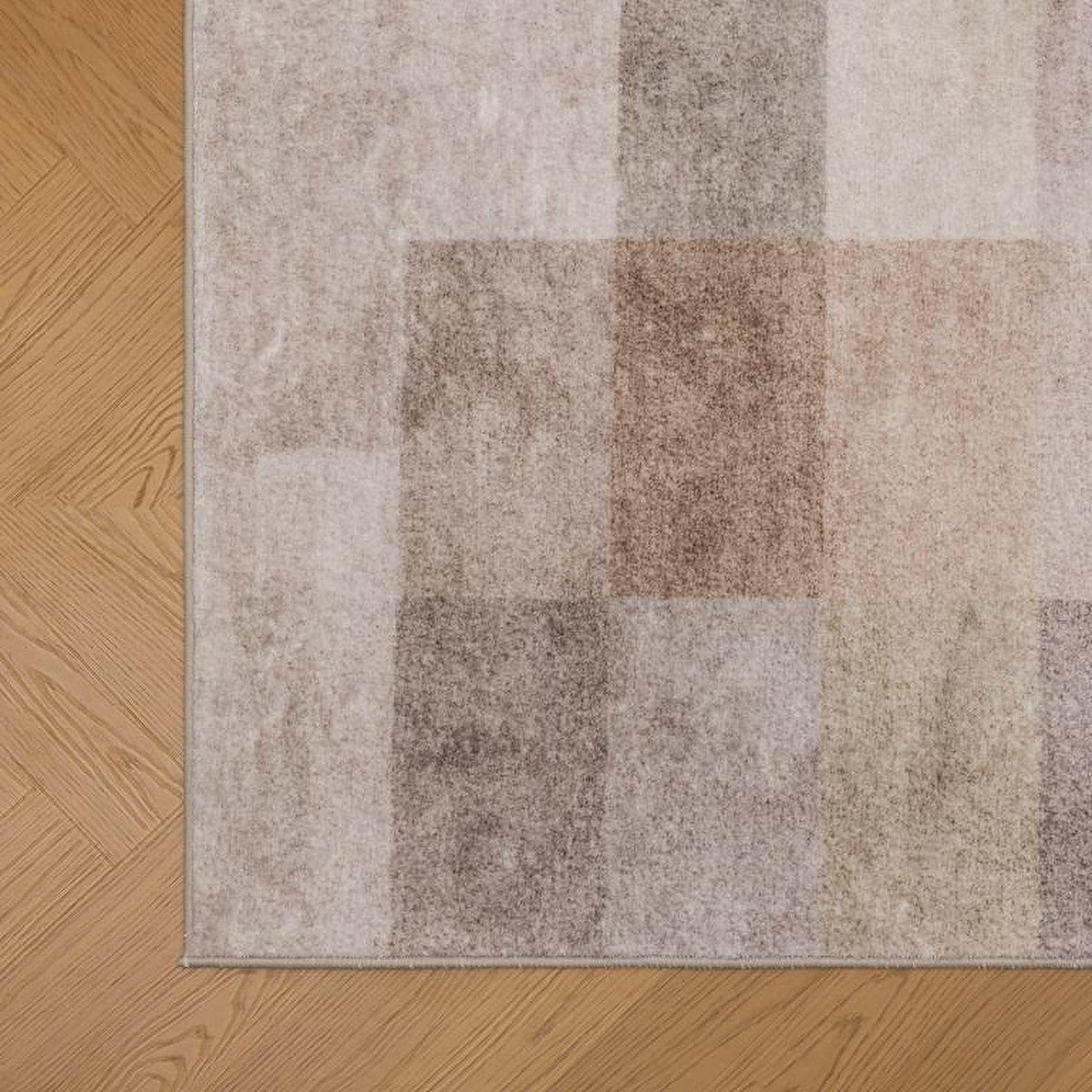 Tapis Albi beige et brun, le bord de près