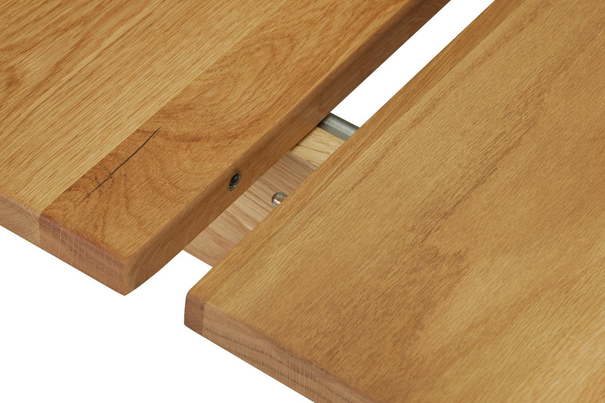 Plateau de la table Victor entrouvert sur sa coulisse, de près