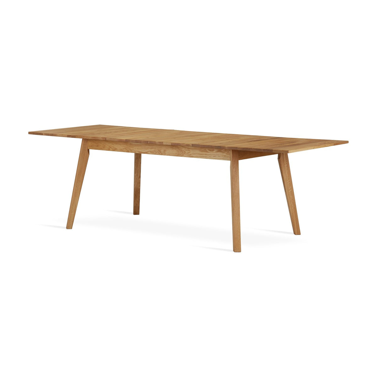 Table Victor ouverte avec son allonge, pieds obliques en chêne
