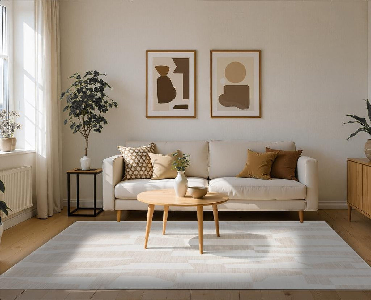Tapis Millau, coloris ivoire et beige, dans une pièce