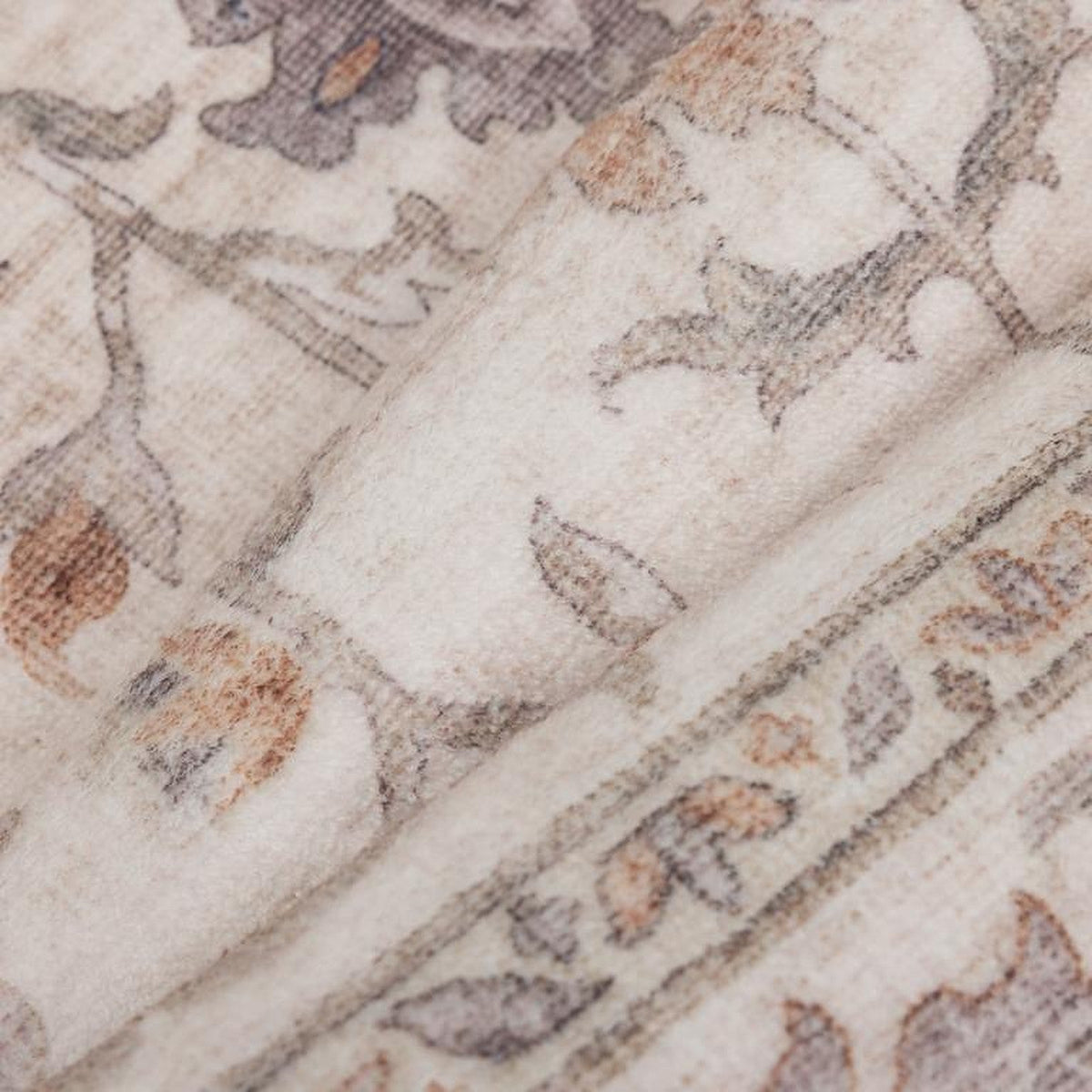 Tapis Albi, coloris beige et terracotta, la matière de près